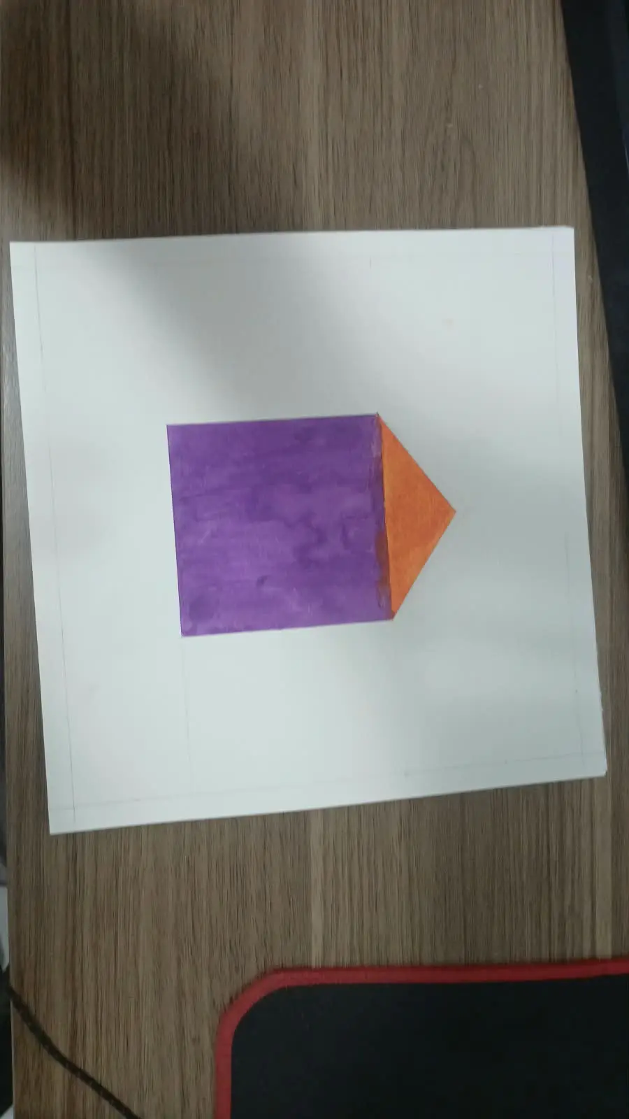A painted line and dot on a folded sheet